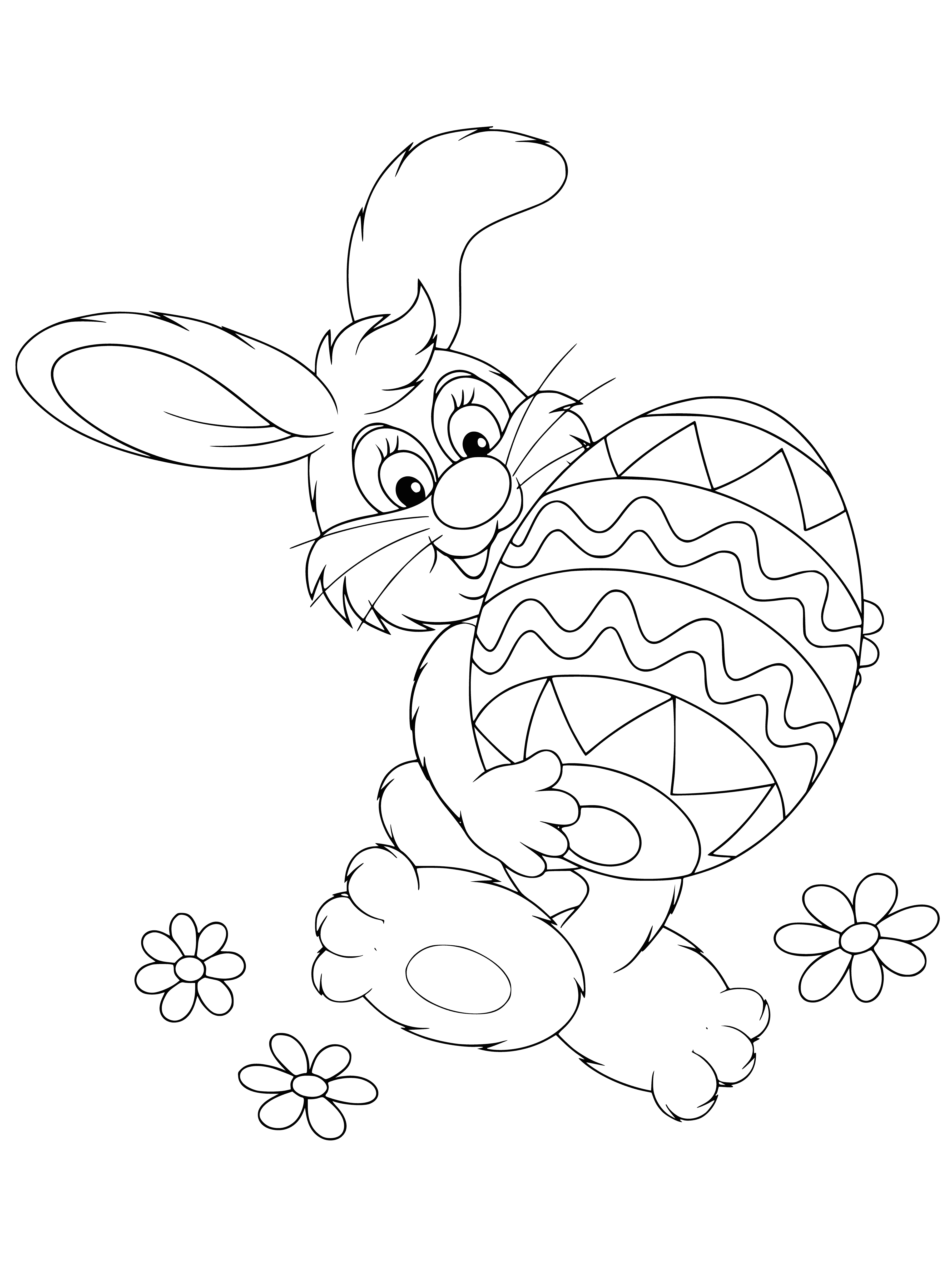 Easter rabbit holds a multicolored egg