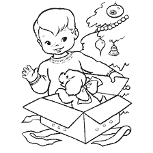 Boy opens presents at Christmas tree