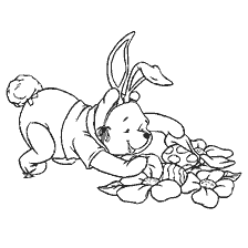 Winnie the Pooh in rabbit costume picks flowers and looks for Easter eggs